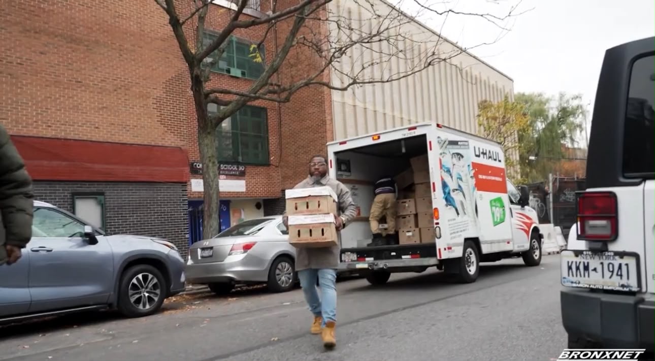 BronxNet Feature - Bishop Singletary Carrying Boxes from the U-Haul